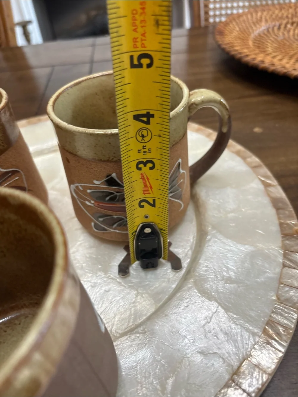 Three vintage stoneware pottery mugs with hand painted fish